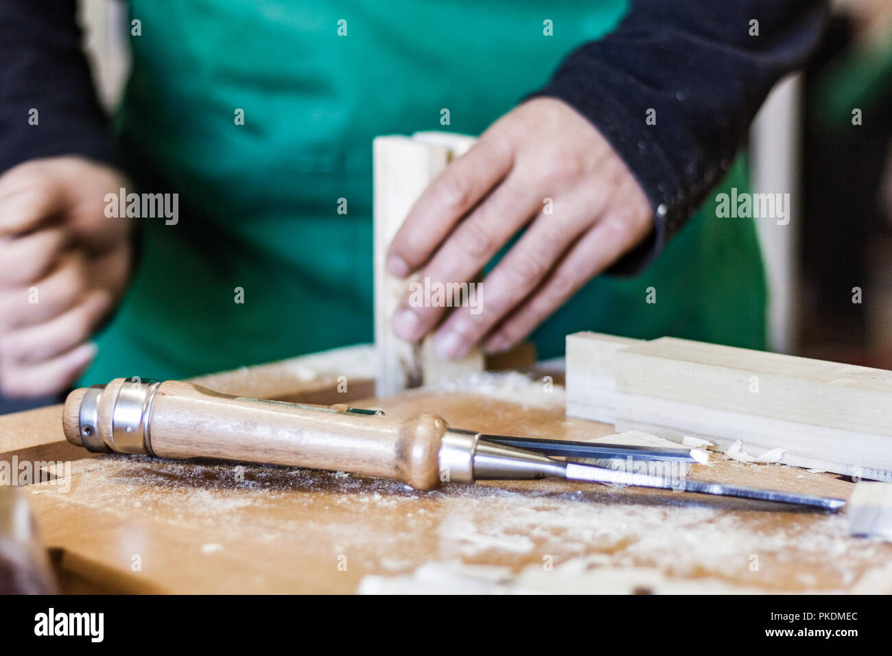 Professional store in Italy, focus on hands and working tools