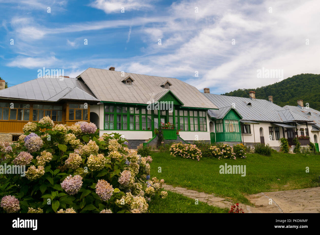 old-typical-romanian-houses-facade-with-painted-wood-doors-and-windows