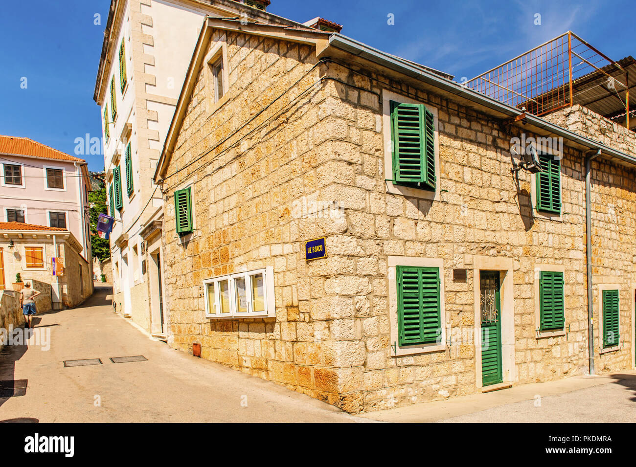 building with green shutters on the Island Brac Stock Photo