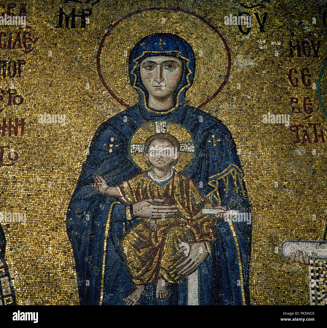 Turkey. Istambul. Hagia Sofia. Byzantine mosaic. Virgin Mother holding the Christ Child. Ca, 1118. 12th century. Detail of the mosaic with emperor John II Comnemus, Virgin Mary with the Child Jesus and the empress Irene. Southern gallery. Stock Photo