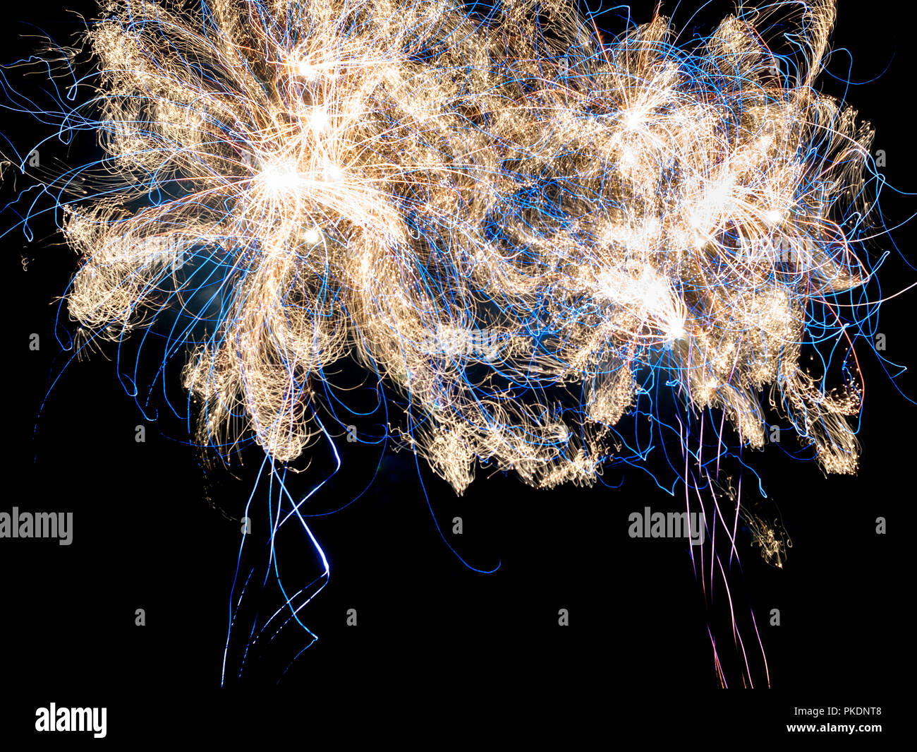 Long exposure of fireworks exploding - France. Stock Photo