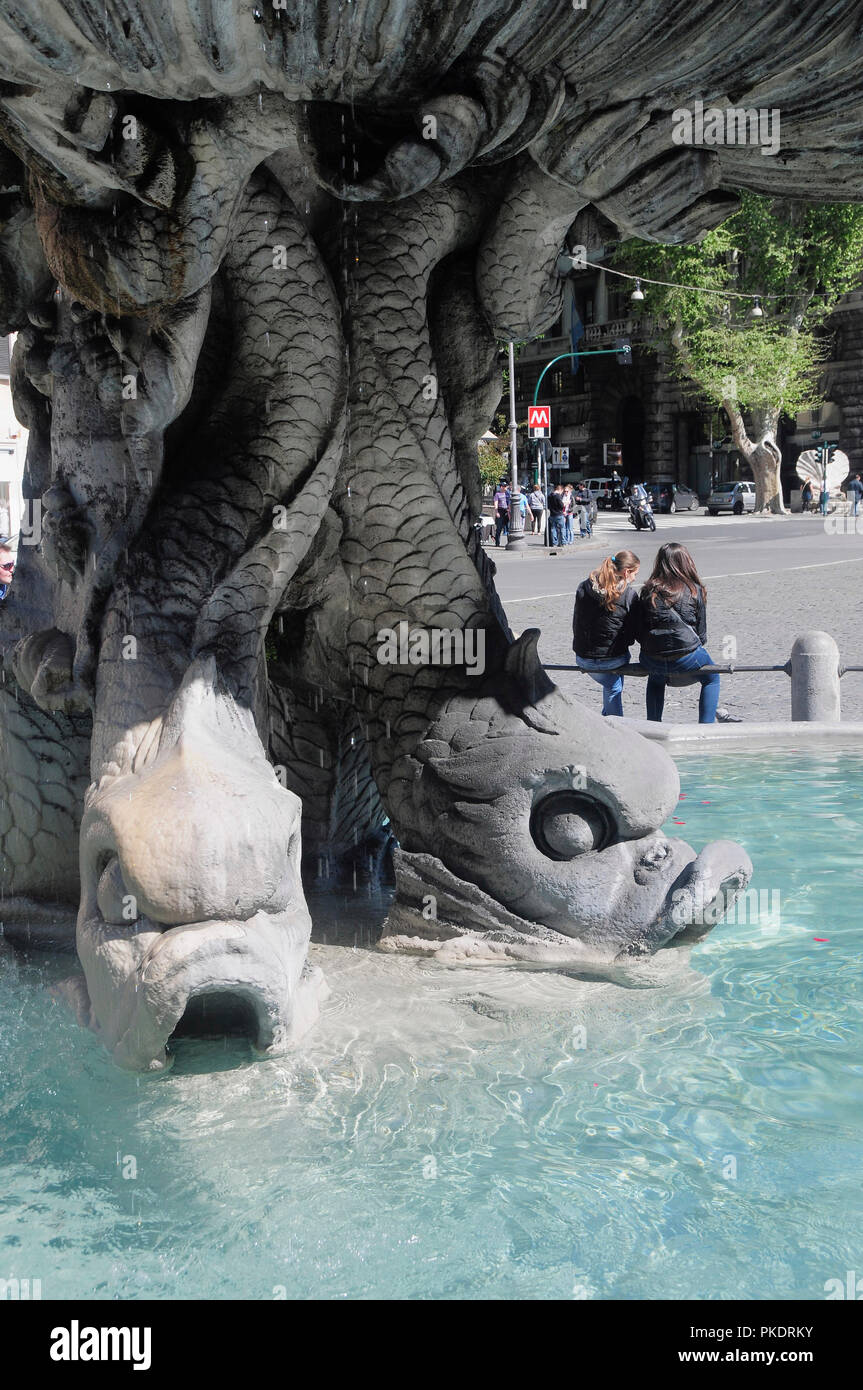 Italy, Lazio, Rome, Quirinal Hill, Piazza Barberini, Bernini's Fontana del Tritone, fish detail. Stock Photo