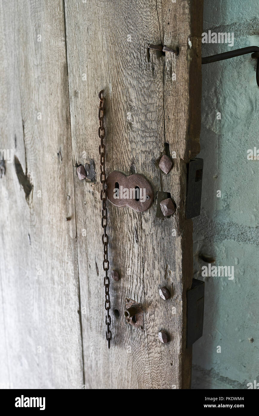 old lock in a wooden door Stock Photo - Alamy