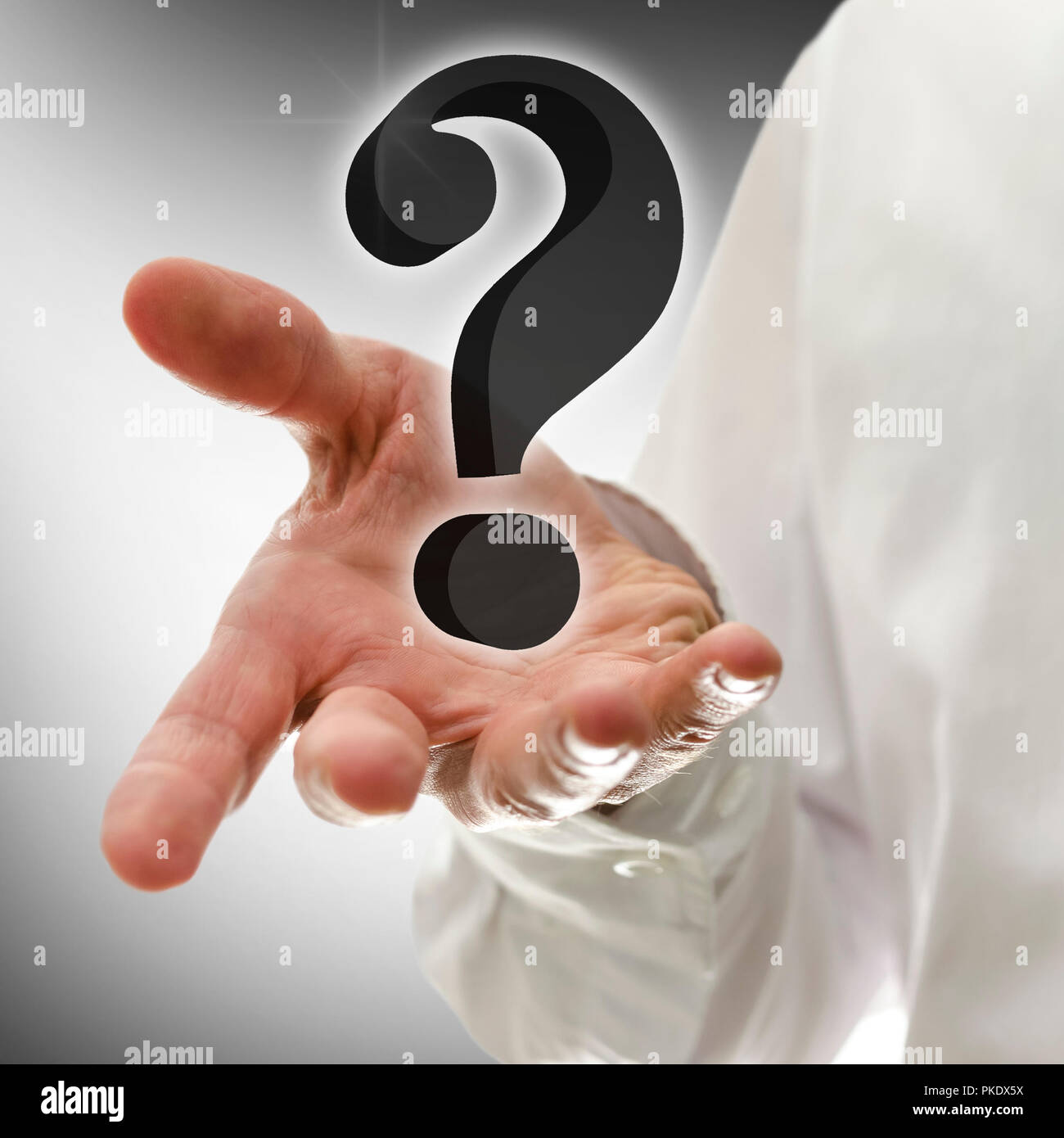 Male hand presenting 3D virtual question mark. Concept of customer support. Stock Photo