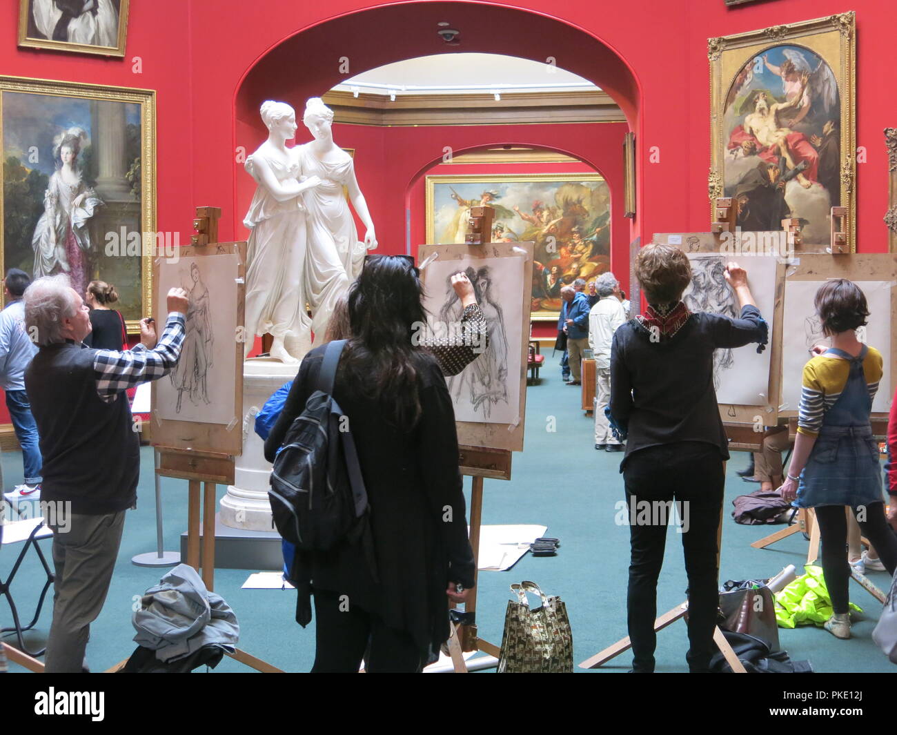 A drop-in session for the public at the Scottish National Gallery on Edinburgh's Princes Street lets you have a go at easel sketching in the Main Hall. Stock Photo