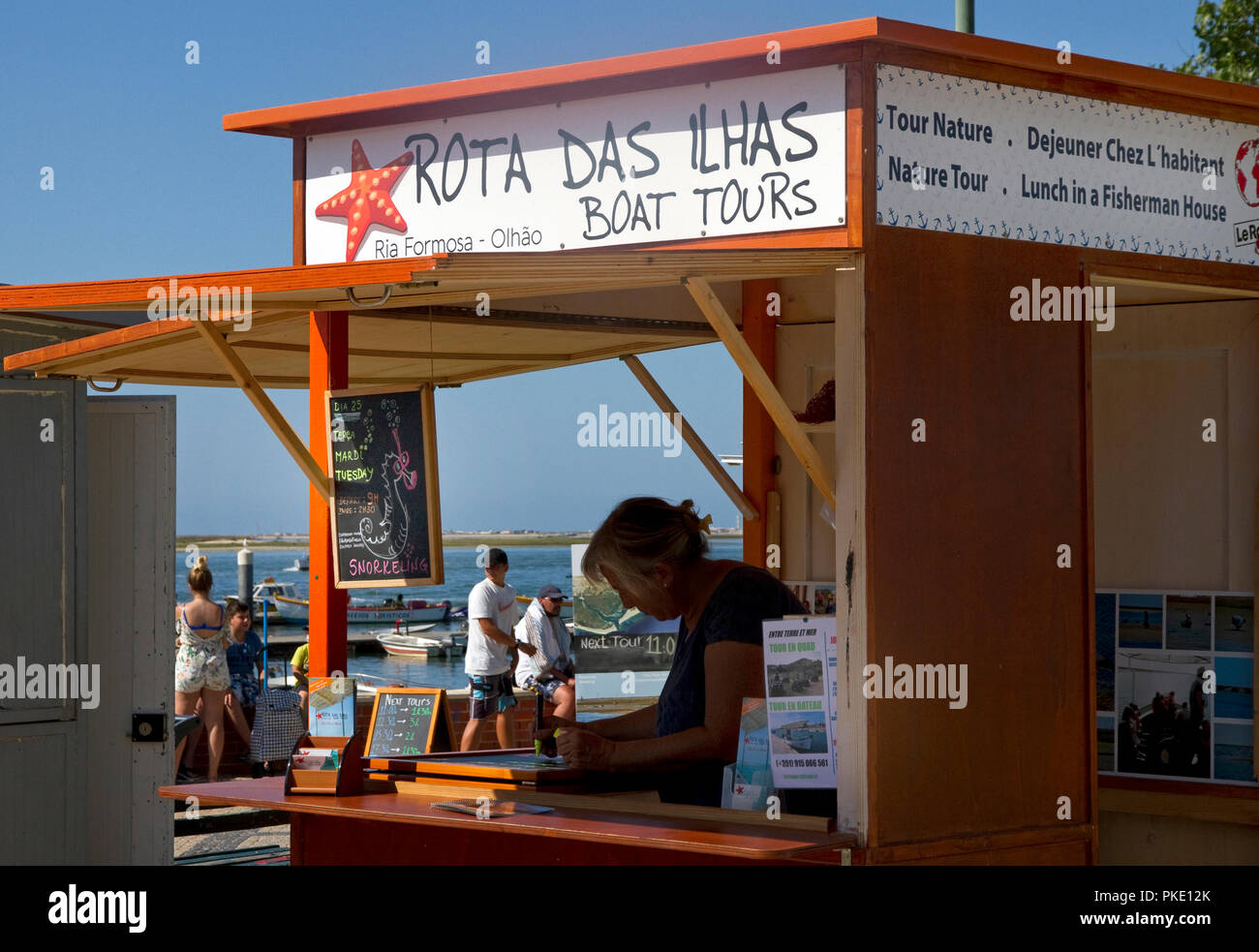 Ticket booth for Boat Tours of Ria Formosa islands and natural park. Harbour, Olhao, Algarve, Portugal Stock Photo