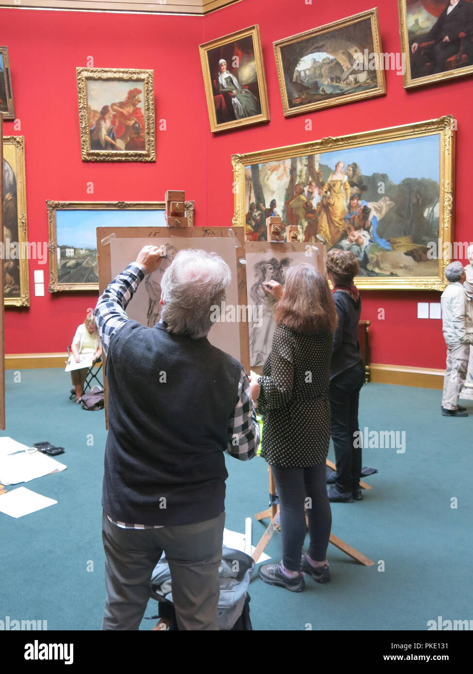 A drop-in session for the public at the Scottish National Gallery on Edinburgh's Princes Street lets you have a go at easel sketching in the Main Hall. Stock Photo