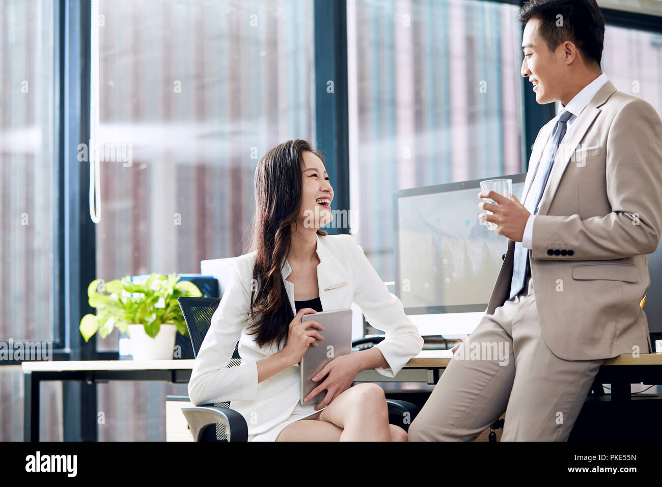 Business men and women in the office Stock Photo - Alamy