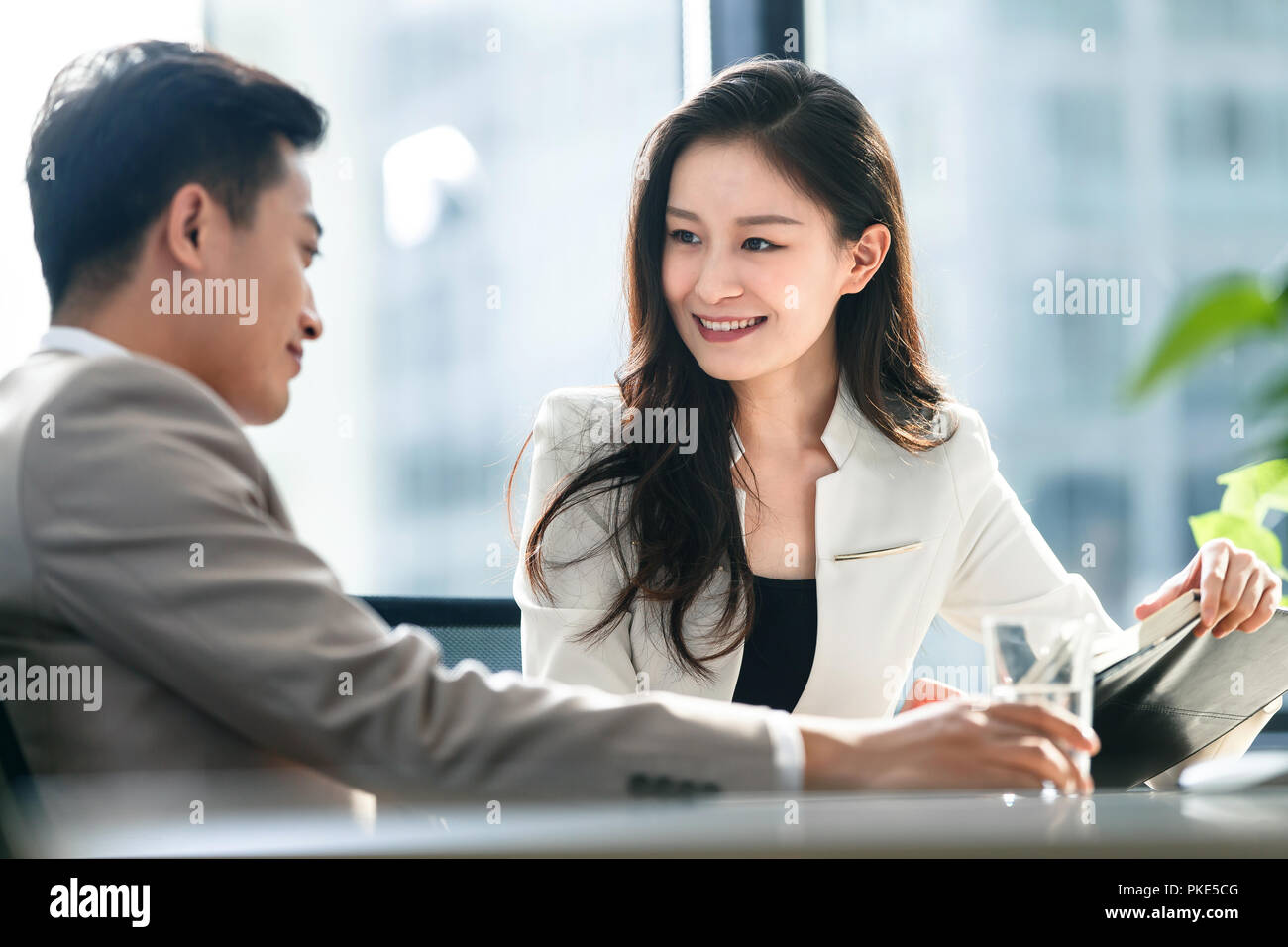 Business men and women in the office Stock Photo - Alamy