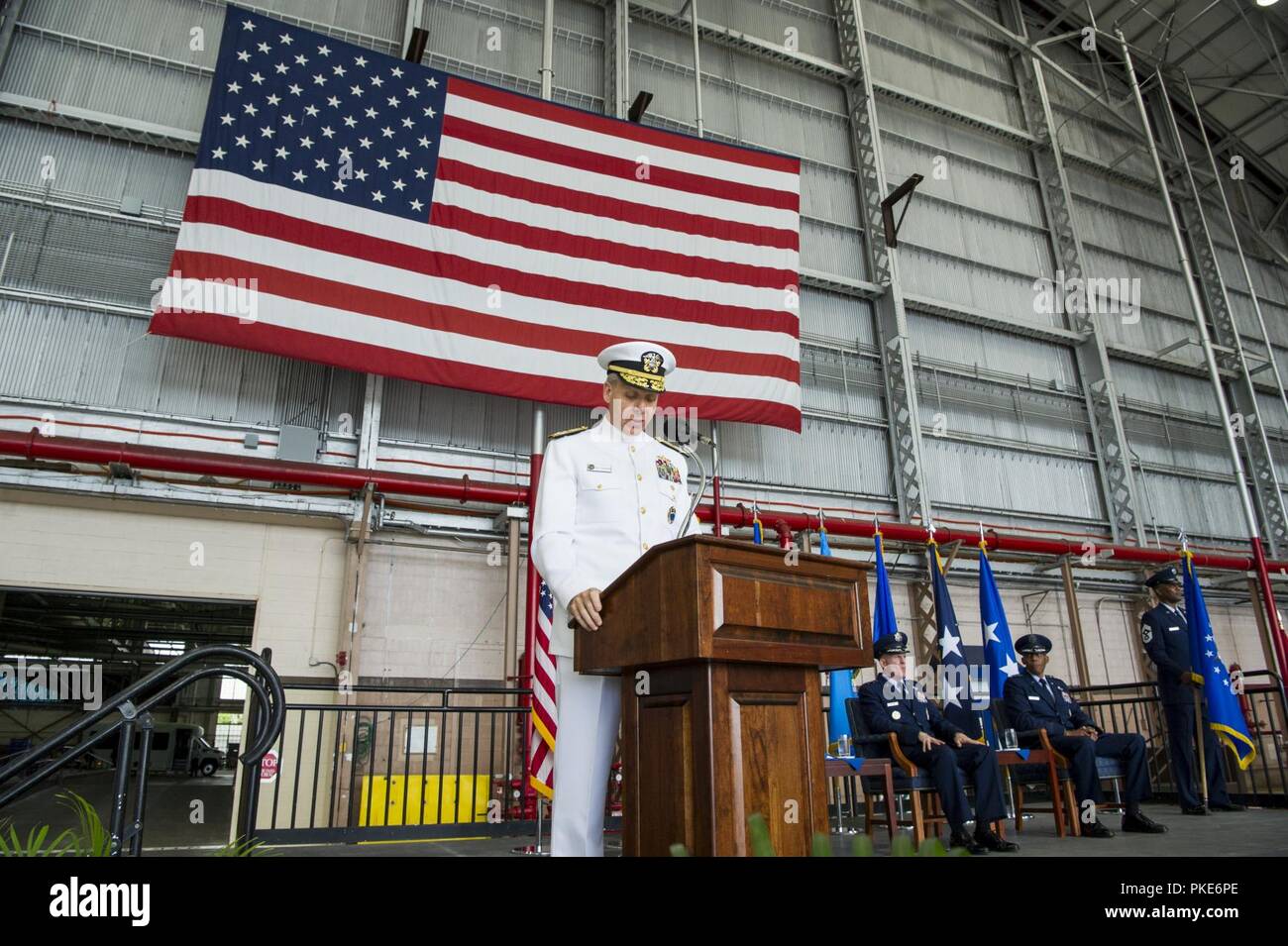 Adm. Philip S. Davidson, U.S. Indo-Pacific Command commander, provides remarks during the Pacific Air Forces (PACAF) assumption of command ceremony at Joint Base Pearl Harbor-Hickam, Hawaii, July 26, 2018. Davidson and Air Force Vice Chief of Staff Gen. Stephen W. Wilson presided over the ceremony in which Brown assumed command of PACAF. Brown now leads U.S. Indo-Pacific Command's air component, delivering airpower across 53 percent of the globe. Stock Photo