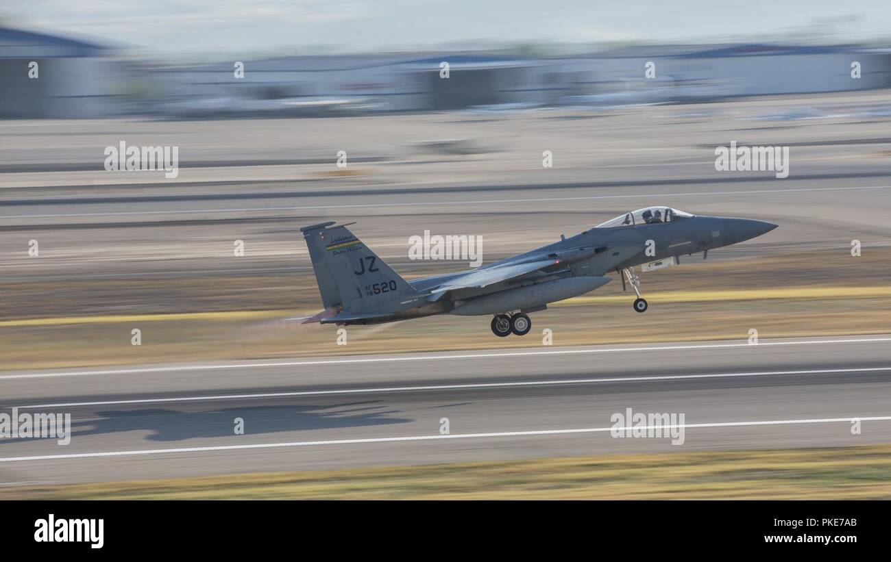 F-15Cs from the 122nd Fighter Squadron of the 159th Fighter Wing, Naval Air Station Joint Reserve Base New Orleans, Louisiana, take off from Gowen Field, Boise, Idaho on July 27, 2018. The 122FS was in Boise to perform dissimilar air combat training with the 190th Fighter Squadron's A-10 Thunderbolt IIs. Stock Photo