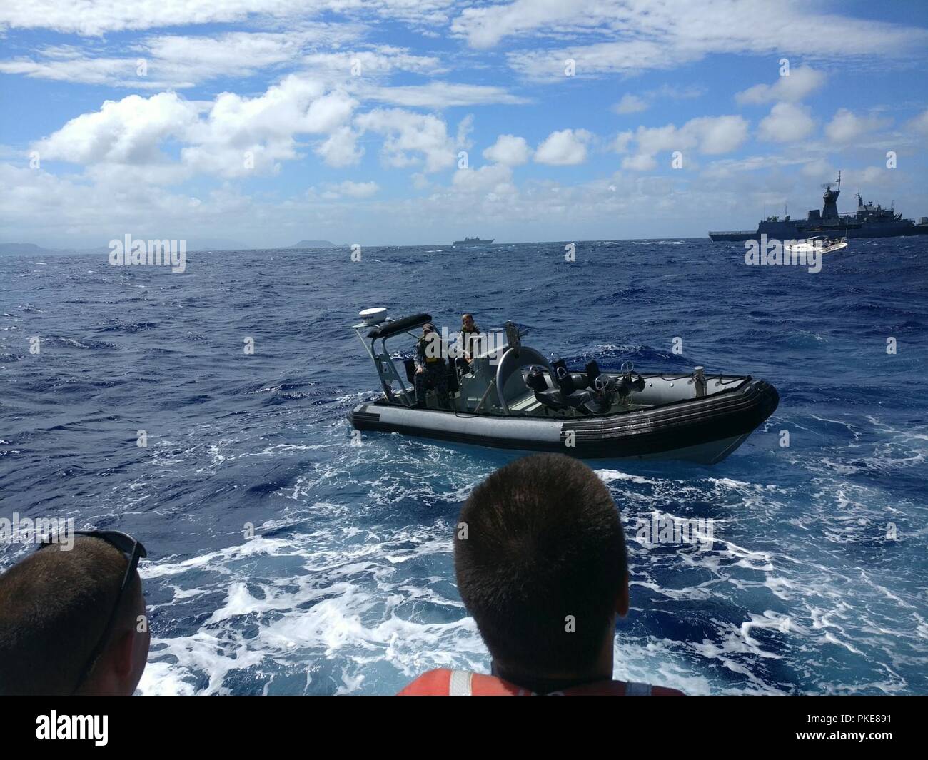 A Coast Guard Station Honolulu 45foot Response BoatMedium crew and a