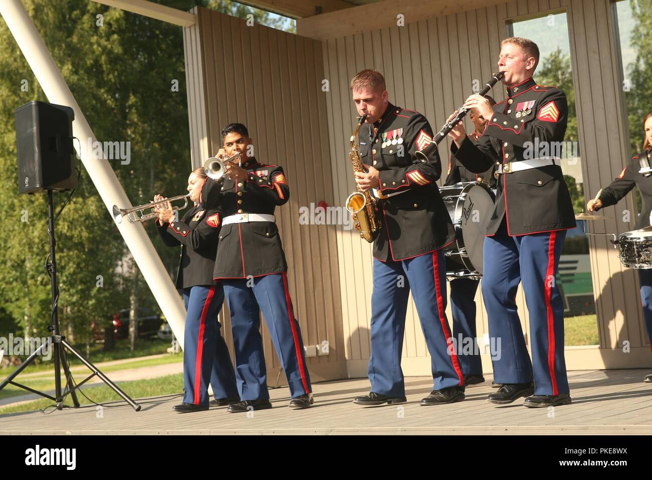 U.S. Marines with the Marine Corps Base Quantico band perform during a concert at Kesaheina, Mantyharju, Finland, July 29, 2018. The band continues to perform at different locations around Finland as they prepare for the 2018 Hamina Tattoo. Stock Photo