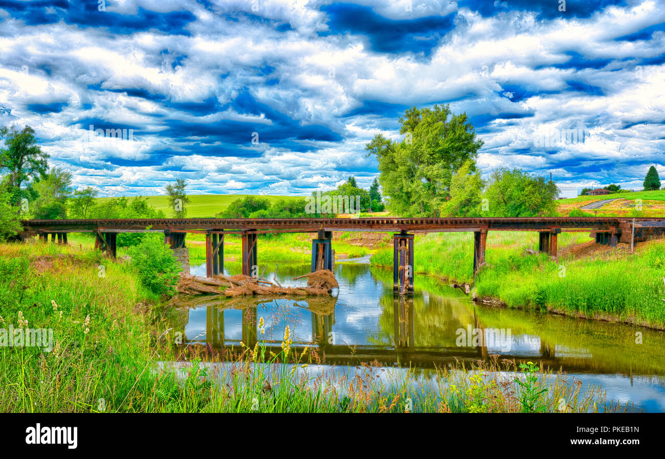 Railway bridge over river, stitched panomora composite; Palouse, Washington, United States of America Stock Photo