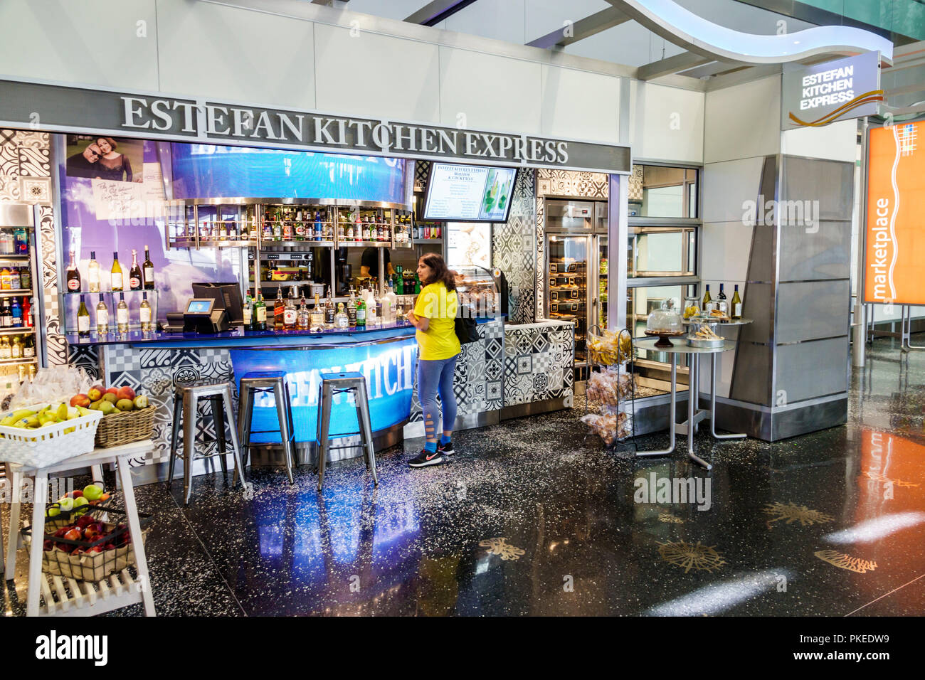 Miami Florida,International Airport MIA,terminal gate,Estefan Kitchen Express,cafe,bar bars lounge pub,counter,adult adults woman women female lady,vi Stock Photo