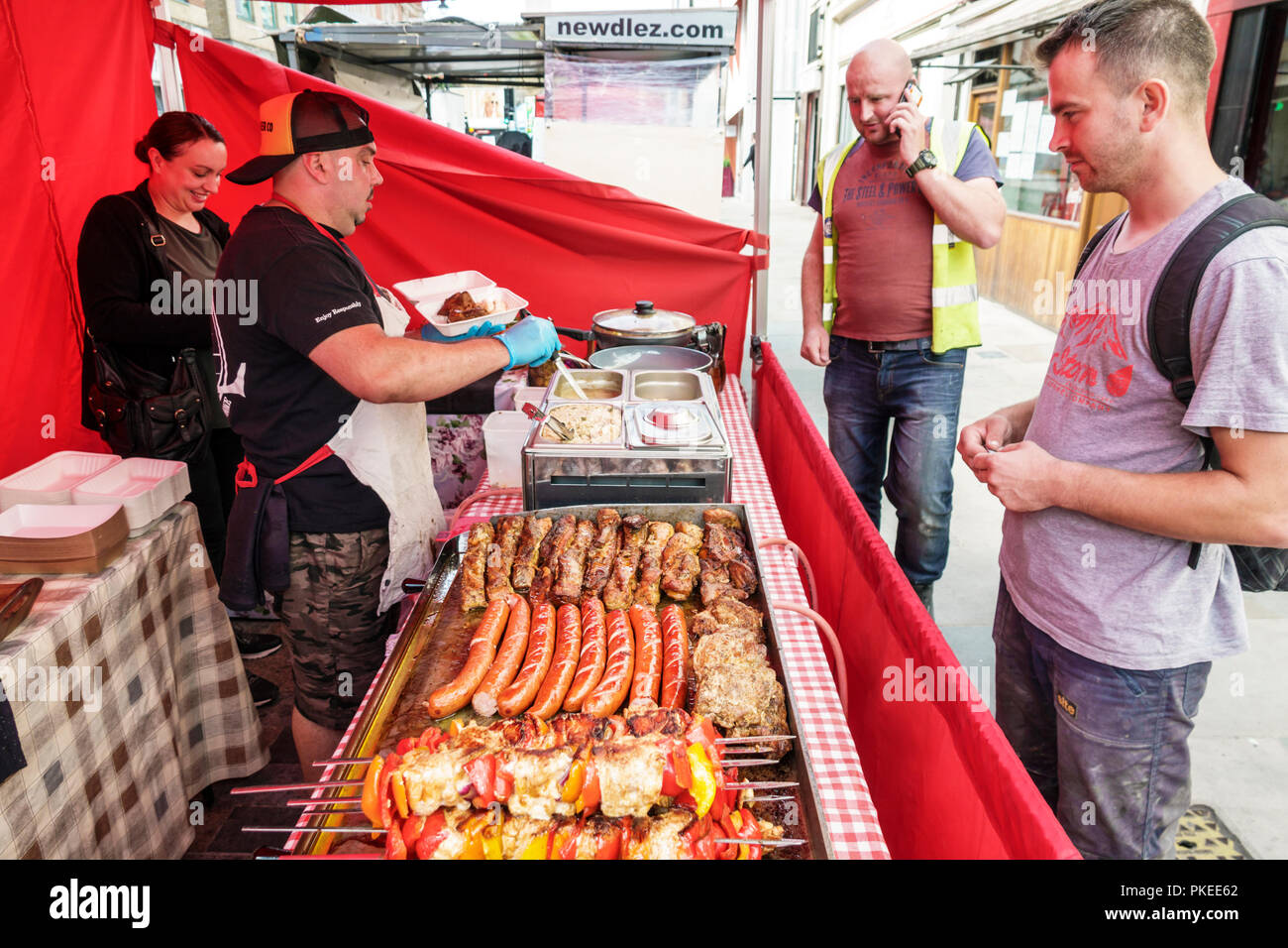 London England,UK,United Kingdom Great Britain,South Bank,Waterloo,historic Lower Marsh,street market,food vendor stall,server,adult adults man men ma Stock Photo