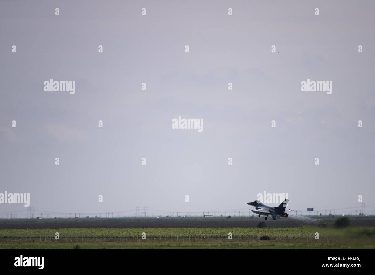 A Romanian air force pilot takes off in an F-16 Fighting Falcon on ...