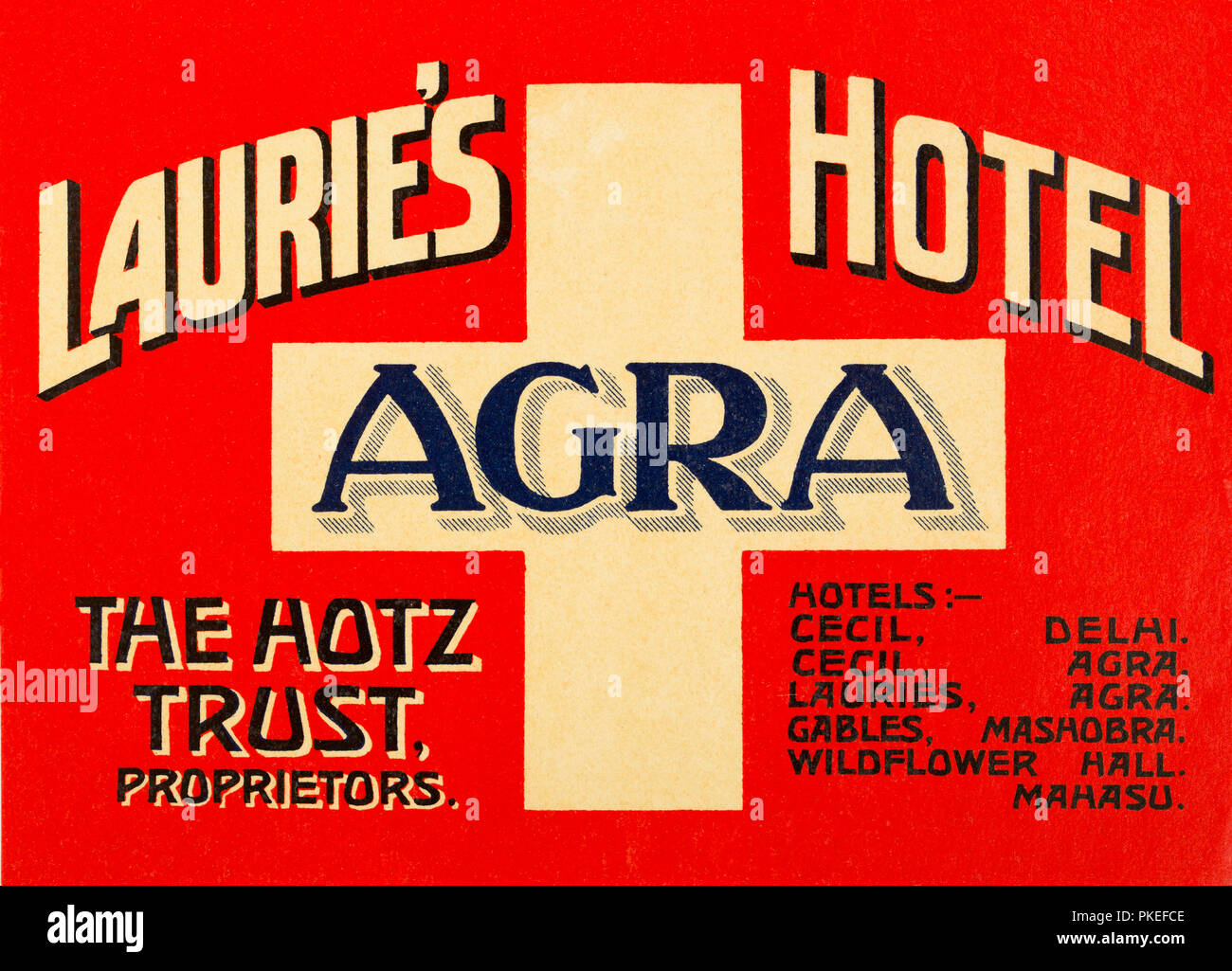 A vintage luggage label for Laurie's Hotel in Agra, India - The Hotz Trust, Proprietors - The equilateral cross and colors have their origins from the Stock Photo