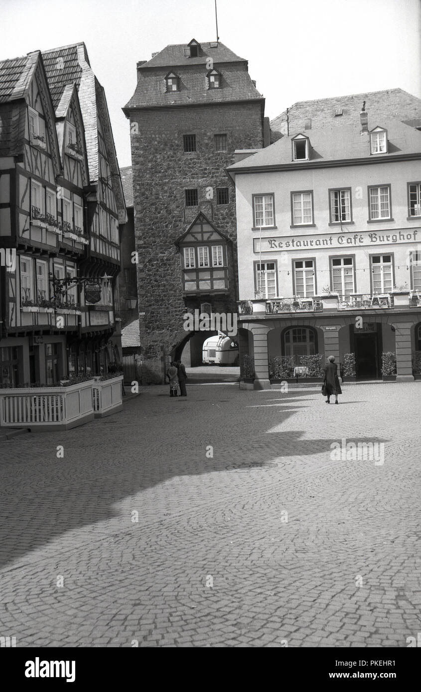 1950s, historica, Koln, Germany, the Old Town of the city showing a market square, old buildings, and historic tower. Stock Photo