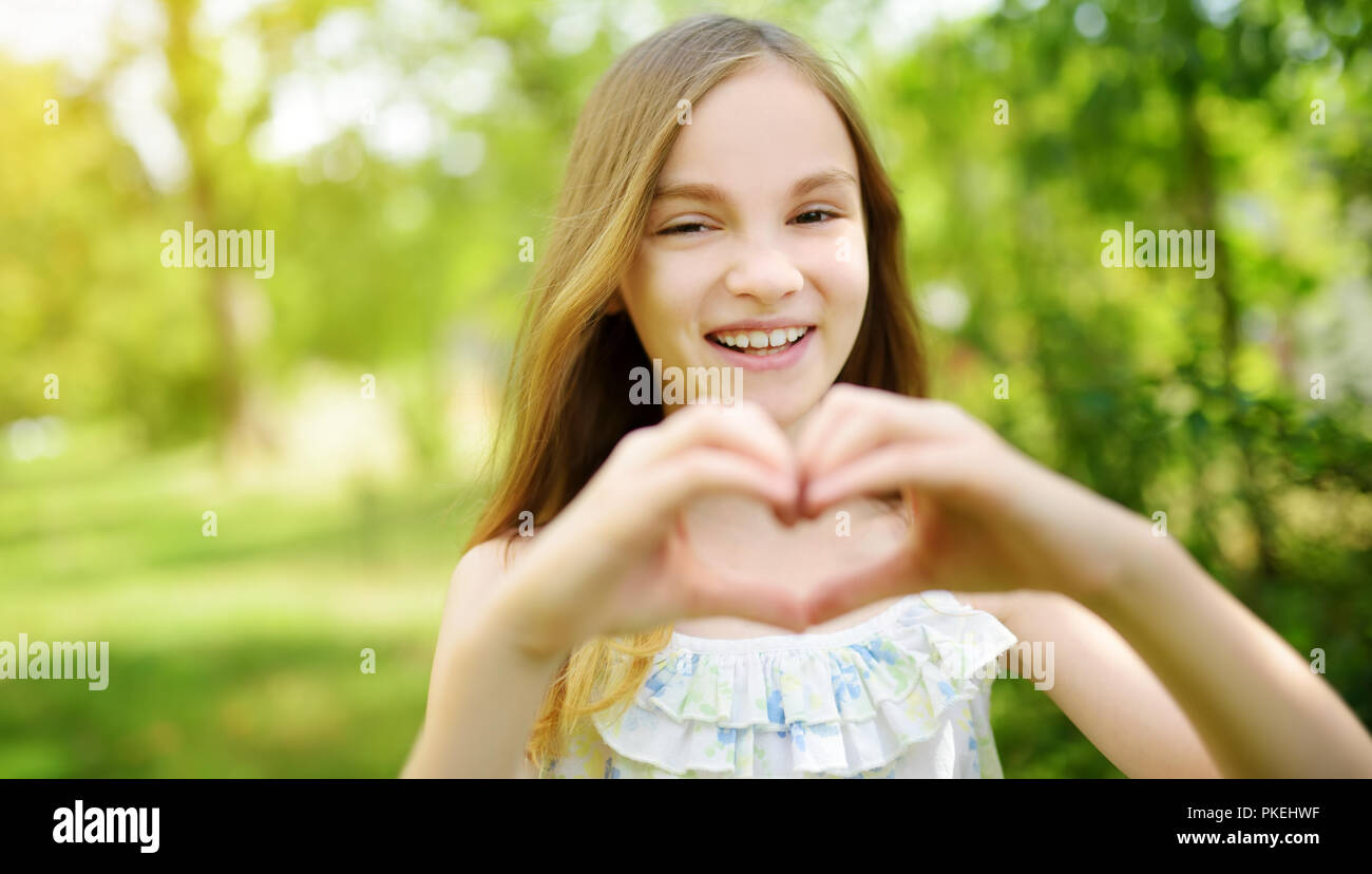 Young Girl Playing Herself On High Resolution Stock Photography And