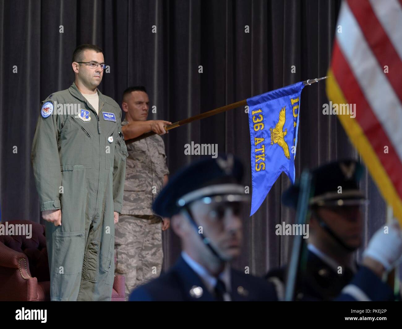 Lt. Col. Shawn Reynolds, commander of the 136th Attack Squadron, 107th Attack Wing, New York National Guard, prepares to take command of the squadron during a ceremony at Niagara Falls Air Reserve Station, N.Y., Aug, 11, 2018. The outgoing commander, Lt. Col. Michael Galvin, relinquishes command as he retires. Stock Photo