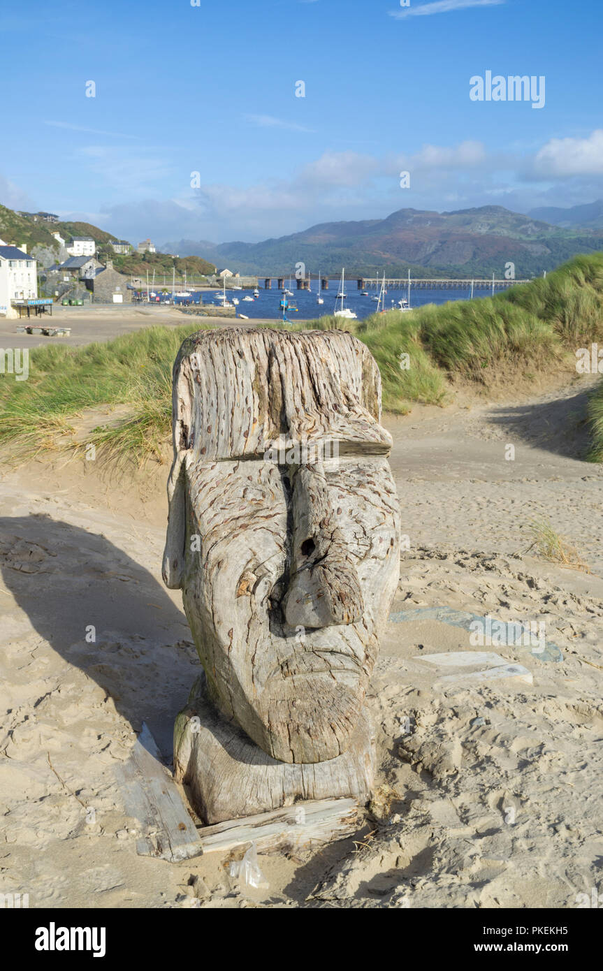 Wooden sculpture on Barmouth beach, Snowdonia National Park, North Wales, UK Stock Photo