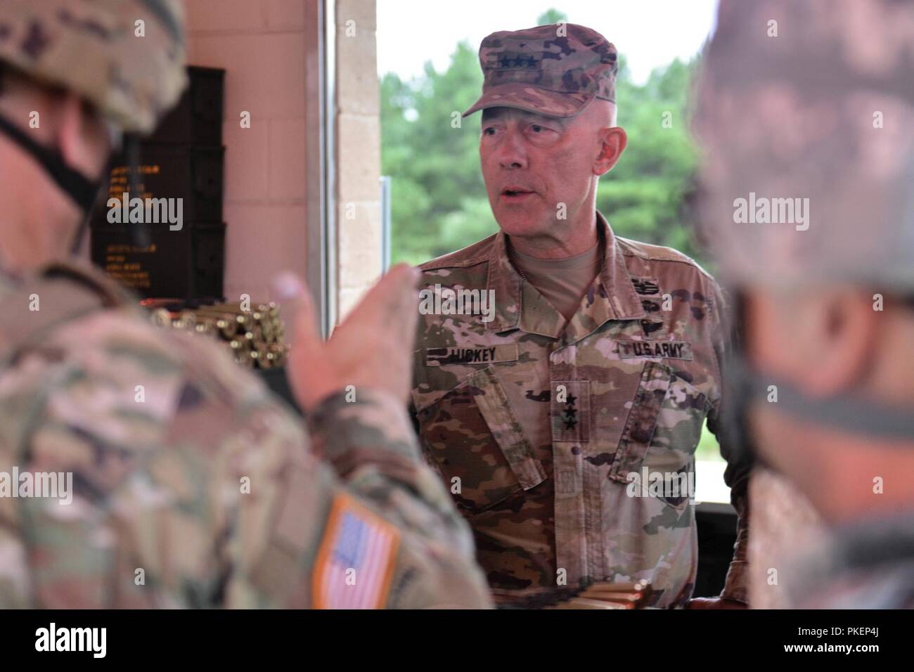 LTG Charles D. Luckey, Chief of Army Reserve and Commanding General, U.S. Army Reserve Command, views an ammunition point during Task Force Ultimate, Operation Cold Steel II, hosted by U.S. Army Civil Affairs and Psychological Operations Command (Airborne), July 25, 2018 at Joint Base McGuire-Dix-Lakehurst, N.J. Operation Cold Steel is the U.S. Army Reserve's crew-served weapons qualification and validation exercise to ensure America's Army Reserve units and Soldiers are trained and ready to deploy on short notice as part of Ready Force X and bring combat-ready and lethal firepower in support  Stock Photo