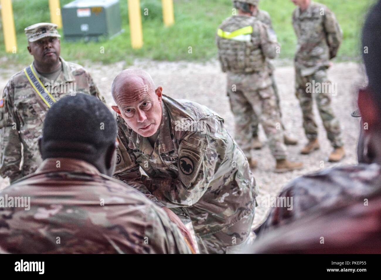 LTG Charles D. Luckey, Chief of Army Reserve and Commanding General, U.S. Army Reserve Command, speaks with Troop List Unit Soldiers during Task Force Ultimate, Operation Cold Steel II, hosted by U.S. Army Civil Affairs and Psychological Operations Command (Airborne), July 25, 2018 at Joint Base McGuire-Dix-Lakehurst, N.J. Operation Cold Steel is the U.S. Army Reserve's crew-served weapons qualification and validation exercise to ensure America's Army Reserve units and Soldiers are trained and ready to deploy on short notice as part of Ready Force X and bring combat-ready and lethal firepower  Stock Photo