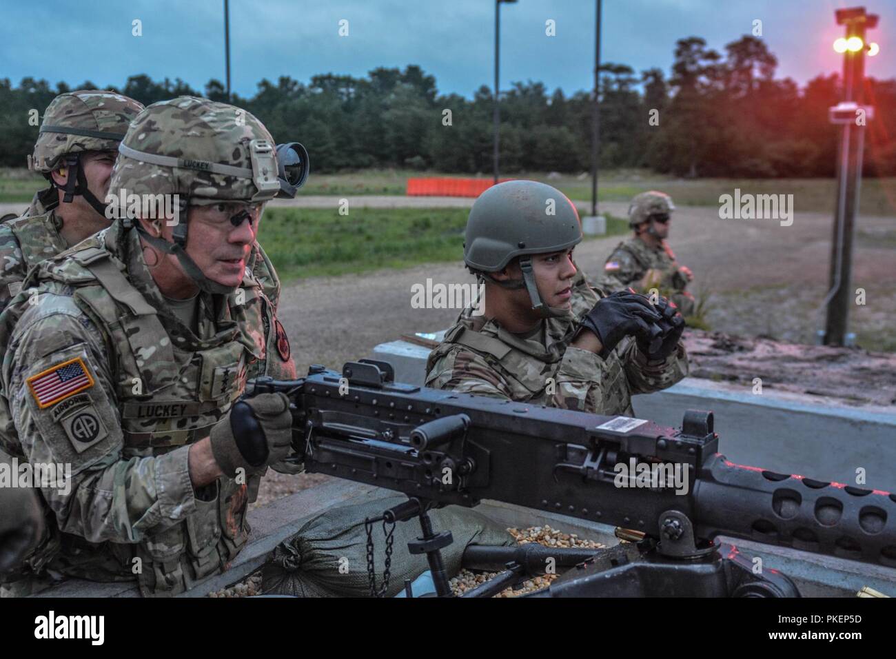 LTG Charles D. Luckey, Chief of Army Reserve and Commanding General, U.S. Army Reserve Command, fires an M2 machine gun during Task Force Ultimate, Operation Cold Steel II, hosted by U.S. Army Civil Affairs and Psychological Operations Command (Airborne), July 25, 2018 at Joint Base McGuire-Dix-Lakehurst, N.J. Operation Cold Steel is the U.S. Army Reserve's crew-served weapons qualification and validation exercise to ensure America's Army Reserve units and Soldiers are trained and ready to deploy on short notice as part of Ready Force X and bring combat-ready and lethal firepower in support of Stock Photo