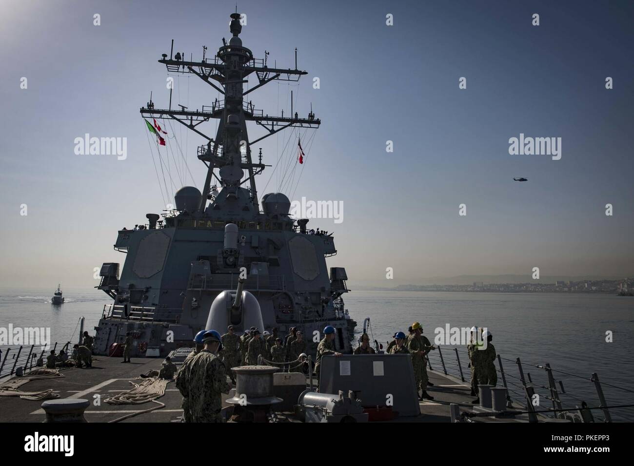 Algeria (July 29, 2018) The Arleigh Burke-class guided-missile destroyer USS Carney (DDG 64) arrives in Algiers, Algeria, for a scheduled port visit July 29, 2018. Carney, forward-deployed to Rota, Spain, is on its fifth patrol in the U.S. 6th Fleet area of operations in support of regional allies and partners as well as U.S. national security interests in Europe  and Africa. Stock Photo