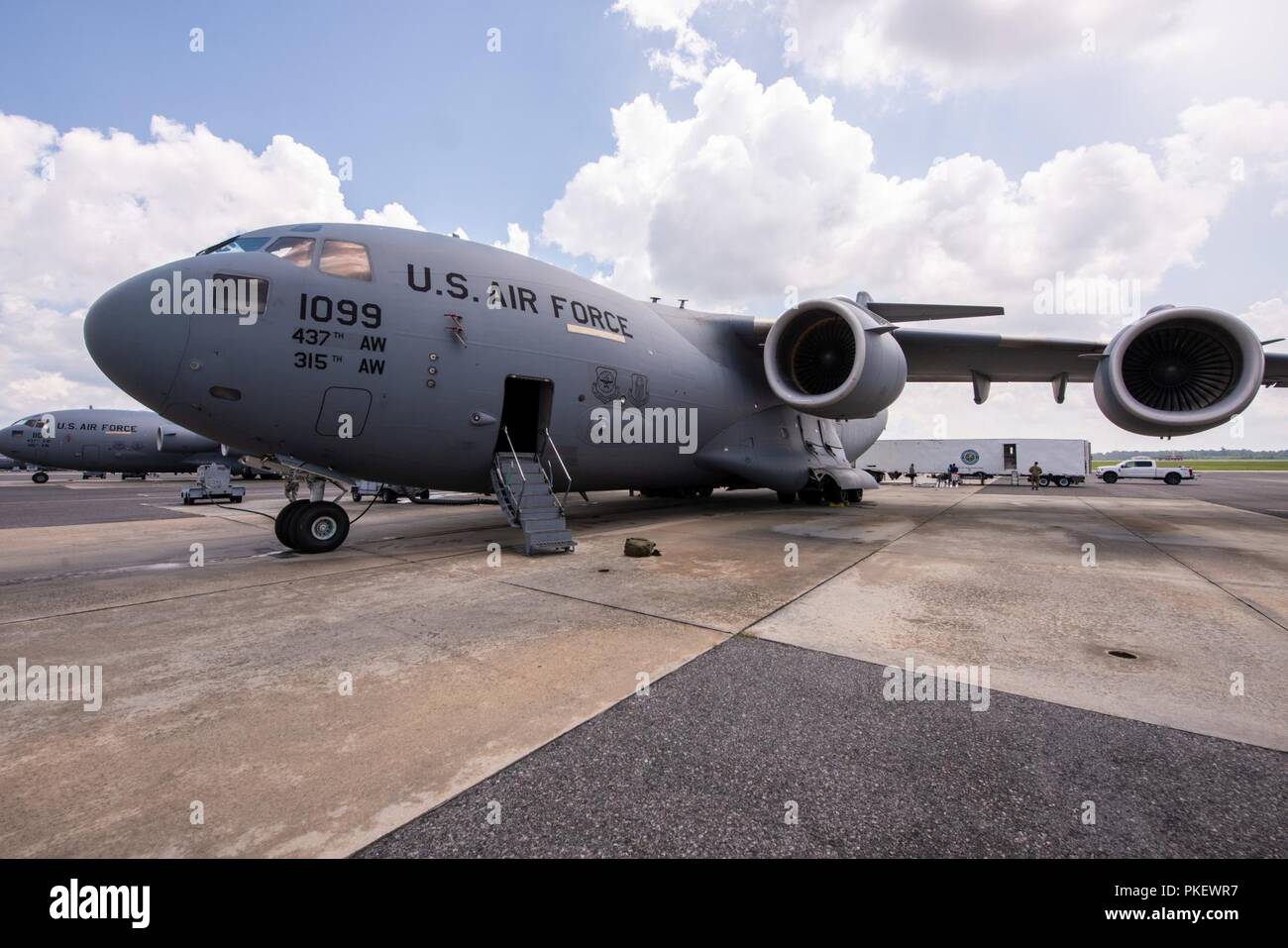 Charleston, S.C. (26 July, 2018) Members of the 437th Aerial Port Squadron conduct a test load of a Large Mobile Air Traffic Control Tower (LMATCT) onto a C-17 Globemaster III July 26 at the Joint Base Charleston - Air Base. The test load was conducted in order to validate the Air Transportability Test Loading Activity certification and ensure the newly constructed towers were compatible for airlift aboard U.S. Air Force aircraft. The new models, specifically designed to be transportable on military airlift, directly support the Federal Aviation Administration Mobile Asset Management Program ( Stock Photo