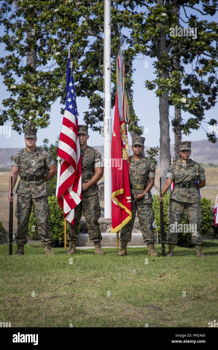 The Marine Corps Air Station Camp Pendleton (MCAS) color guard wait for the MCAS Camp Pendleton change of command ceremony to begin at the Santa Margarita Ranch House, Marine Corps Base Camp Pendleton, California, August 2, 2018. The color guard is responsible for rendering appropriate military. Stock Photo
