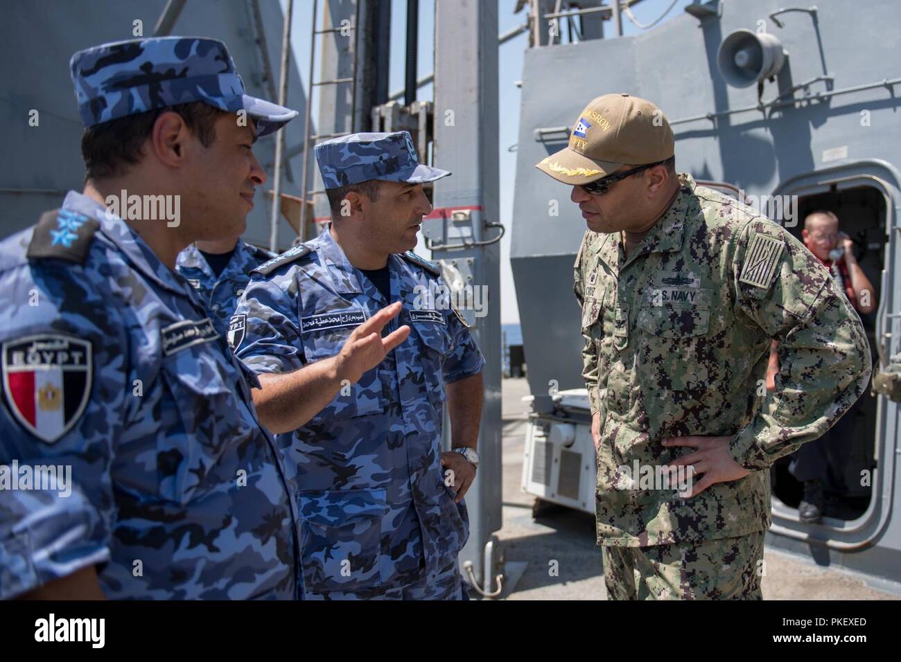 RED SEA (Aug 1, 2018) U.S. Navy Capt. Adan Cruz, right, commodore of U ...