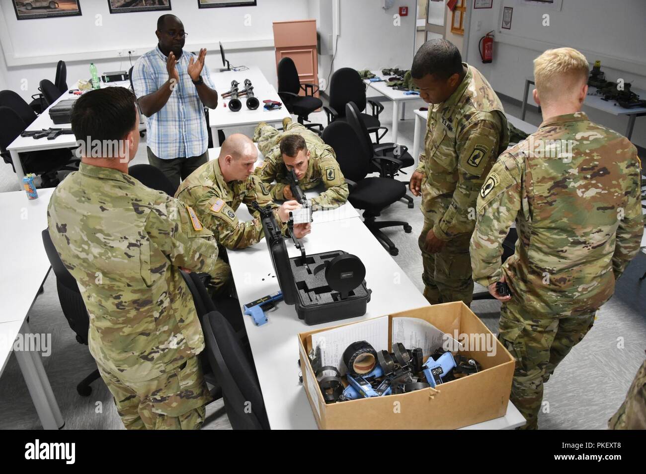 Sunday Omikorede, second from left, a Training Aids and Devices