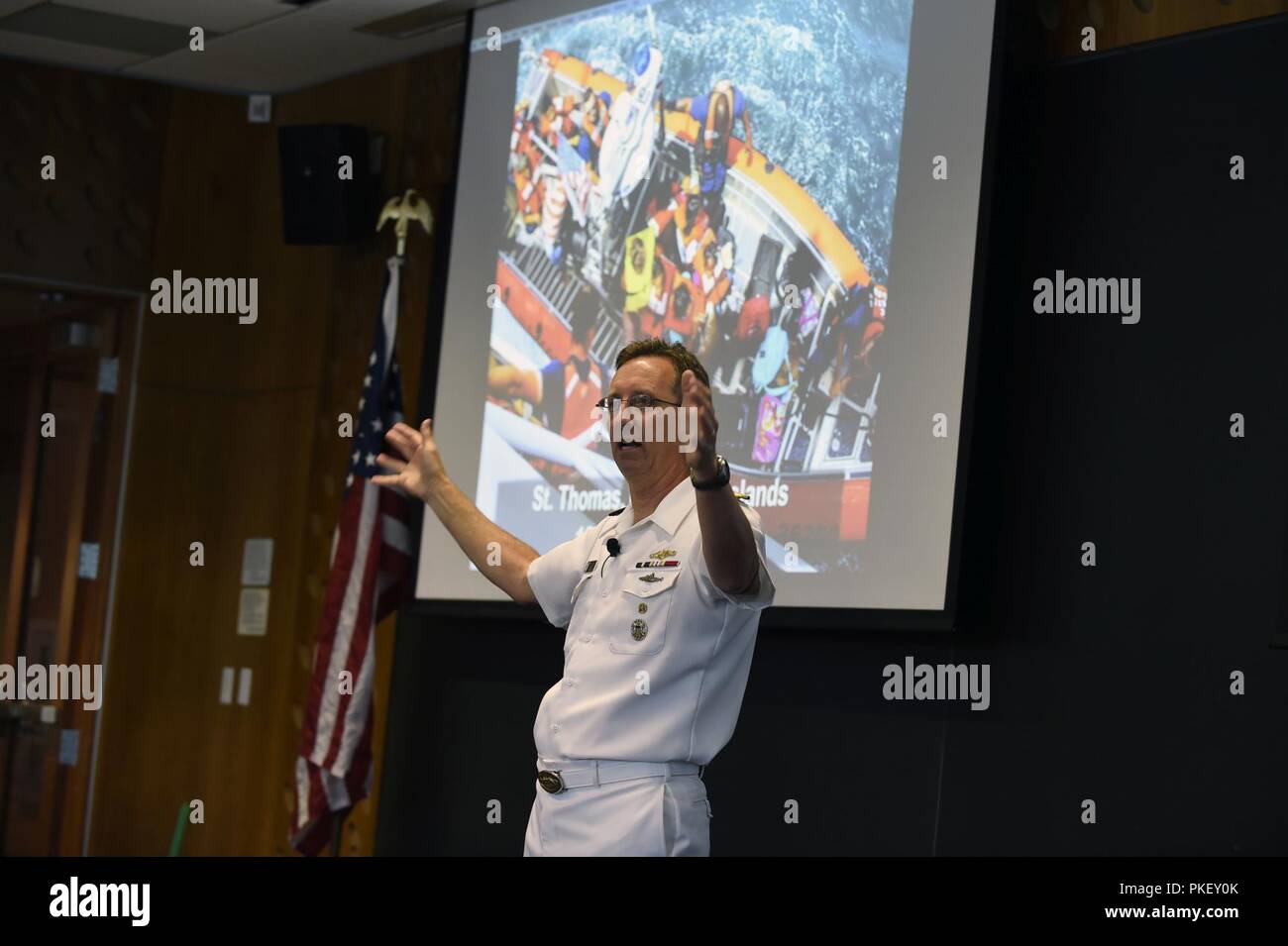 PITTSBURGH, Pa. (Aug. 2, 2018) Rear Adm. David Hahn, chief of naval research, talks at the Artificial Intelligence (AI) & Autonomy for Humanitarian Assistance and Disaster Relief (HADR) workshop, co-hosted by the Office of Naval Research and Carnegie Mellon University, about AI and the Department of the Navy. The workshop brings together a community of academia, industry, and government stakeholders with a diverse pool of first responders in order to accelerate the experimentation, fielding, and scaling of new AI and autonomous capabilities in support of the HADR mission. Stock Photo