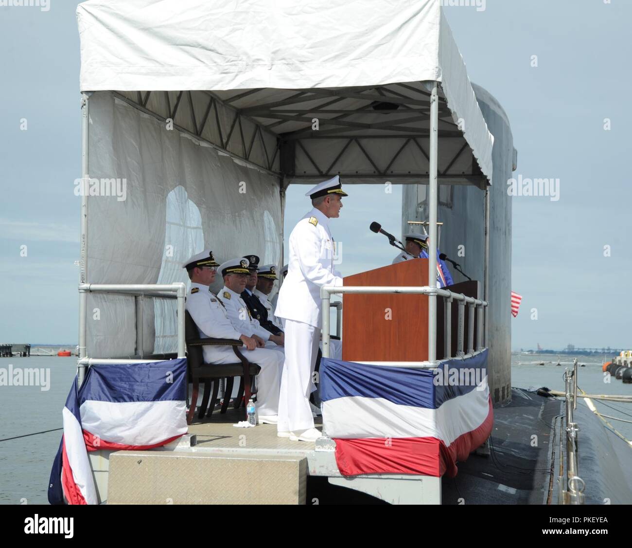 NORFOLK, Va. (Aug. 3, 2018) Vice Adm. Charles A. Richard, the incoming commander of Submarine Forces, reads his orders during the Submarine Force change of command ceremony aboard the Virginia-class fast-attack submarine USS Washington (SSN 787) in Norfolk, Va. Vice Adm. Richard relieved Vice Adm. Joseph E. Tofalo as commander of Submarine Forces. Stock Photo