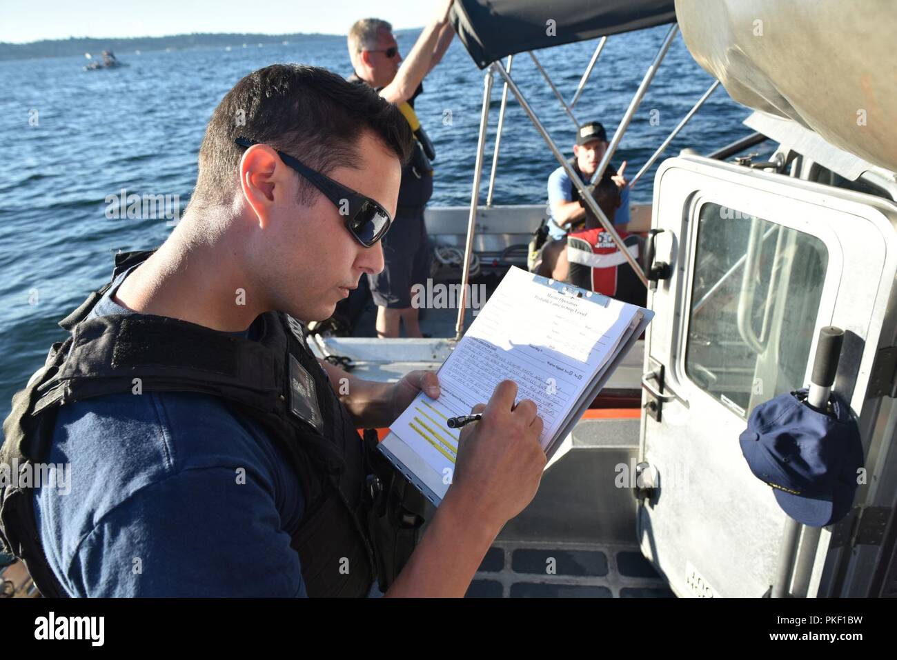 Coast Guard Petty Officer 2nd Class Mark Keightley, a boarding officer