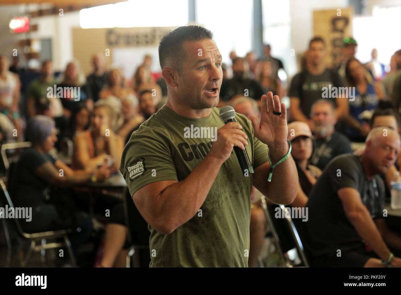 Jimi Letchford, Marine veteran and Global Brand Manager for CrossFit,  speaks to CrossFit affiliates at a reception during the 2018 Reebok  CrossFit Games in Madison, Wisconsin, August 2, 2018. The CrossFit Games