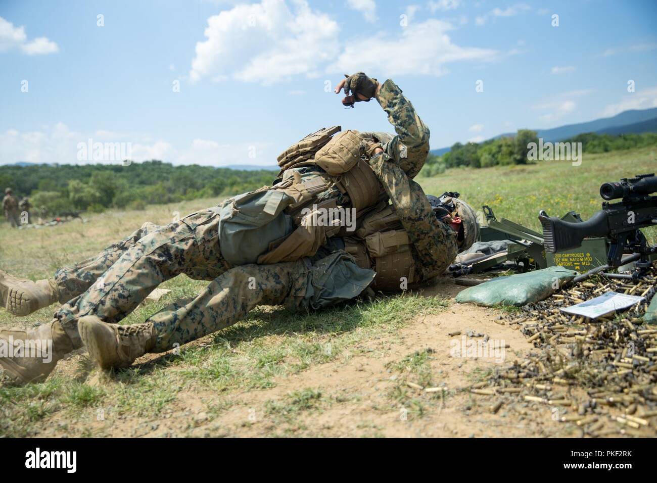 U.S. Marines with Black Sea Rotational Force 18.1, execute a dead gunman drill during Exercise Platinum Lion 18 at Novo Selo Training Area, Bulgaria, Aug. 3, 2018. Platinum Lion is an annual field training exercise that reinforces relationships in a joint training environment, builds understanding of partner nation tactics, techniques and procedures, and increases interoperability with Allied and partner forces. Stock Photo