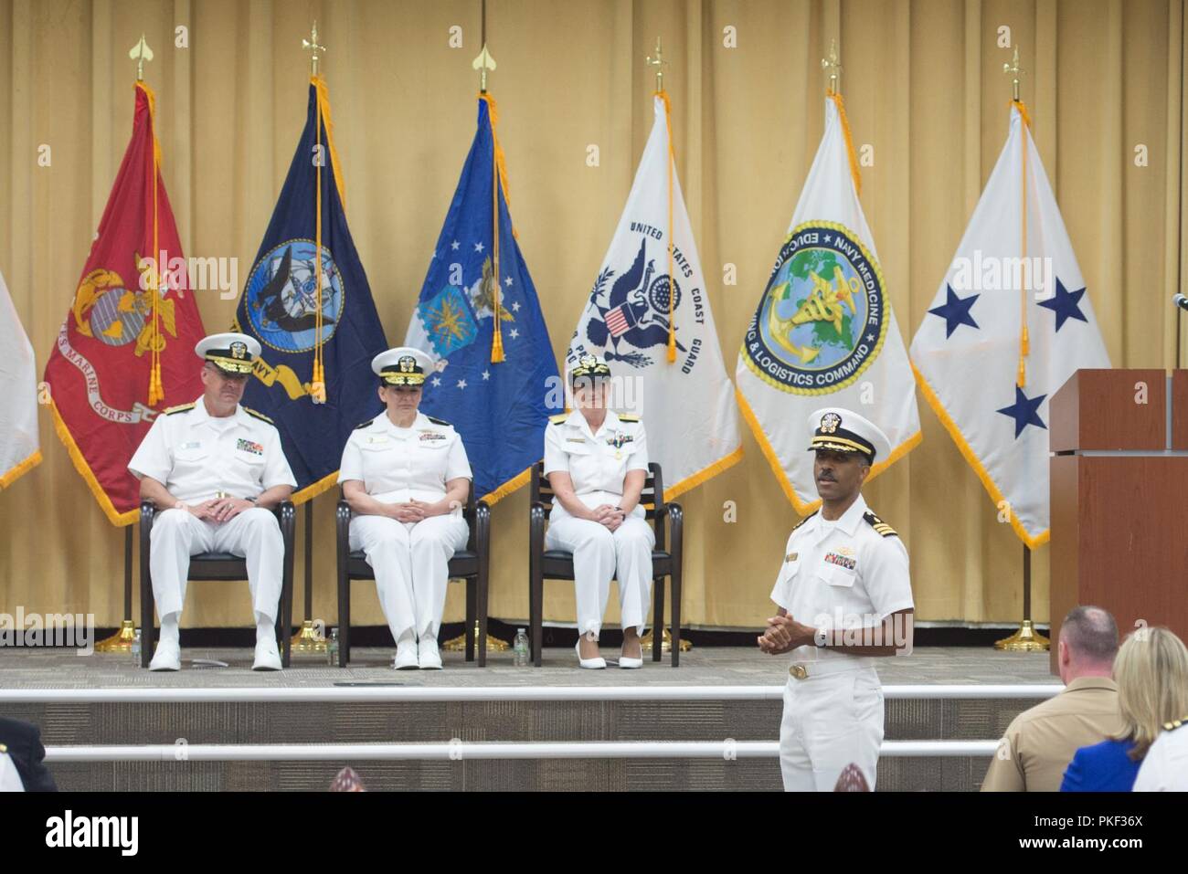 Rear Admiral Tina Davidson, Nurse Corps, U.S.Navy, assumes command of the Navy Medicine Education, Training and Logistics Command from Rear Admiral Rebecca McCormick-Boyle at Joint Base San Antonio-Fort Sam Houston, Texas, Aug. 3, 2018. Vice Admiral C. Forrest Faison, III, surgeon general of the Navy, officiated the time honored ceremony. Stock Photo