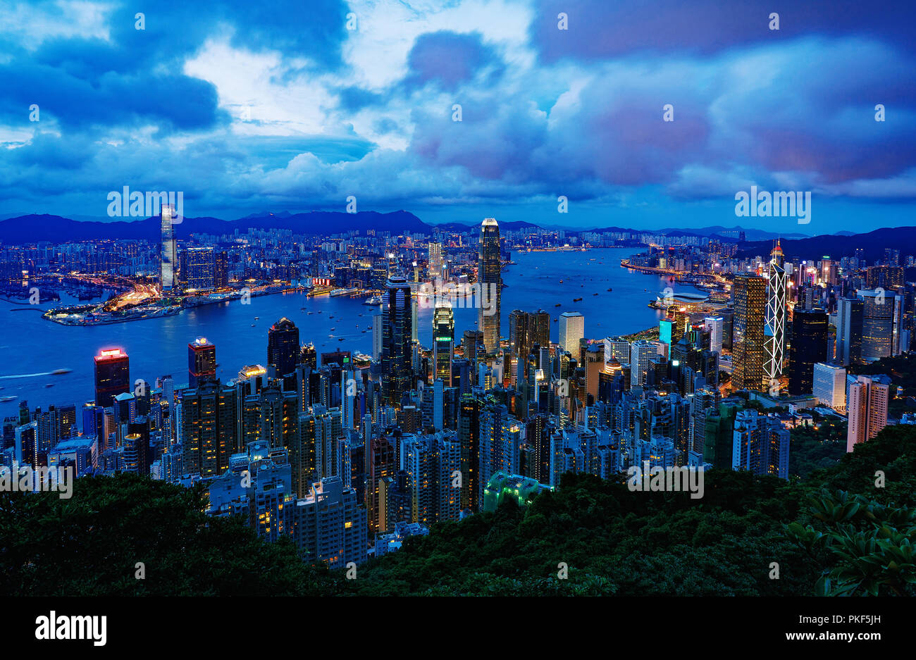 Hong Kong city buildings at night Stock Photo - Alamy