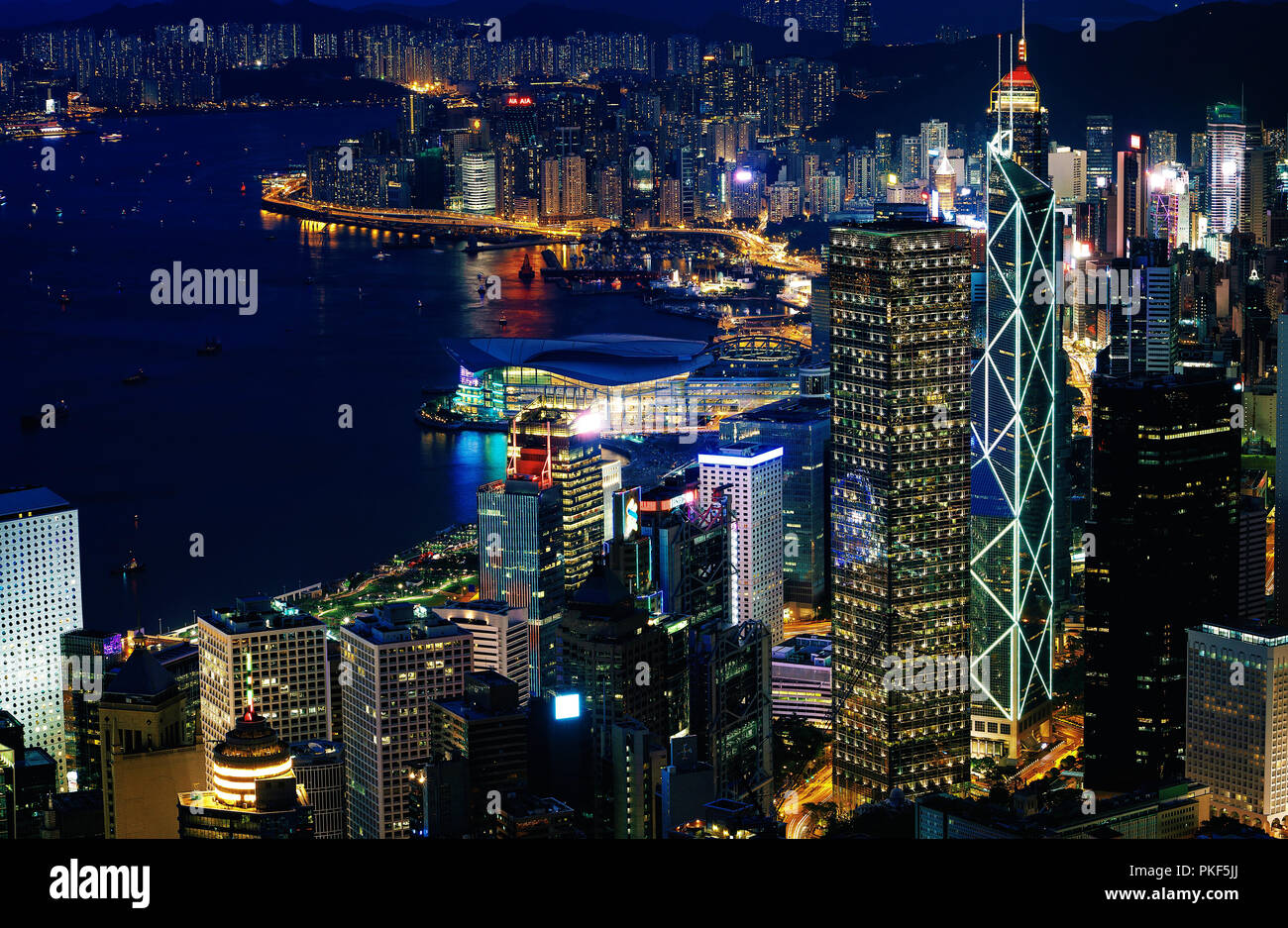 Hong Kong city buildings at night Stock Photo - Alamy
