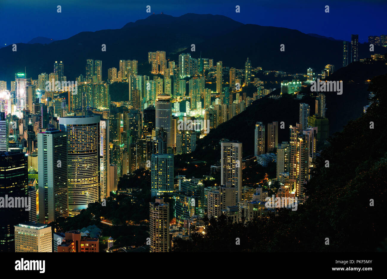 Hong Kong city buildings at night Stock Photo - Alamy