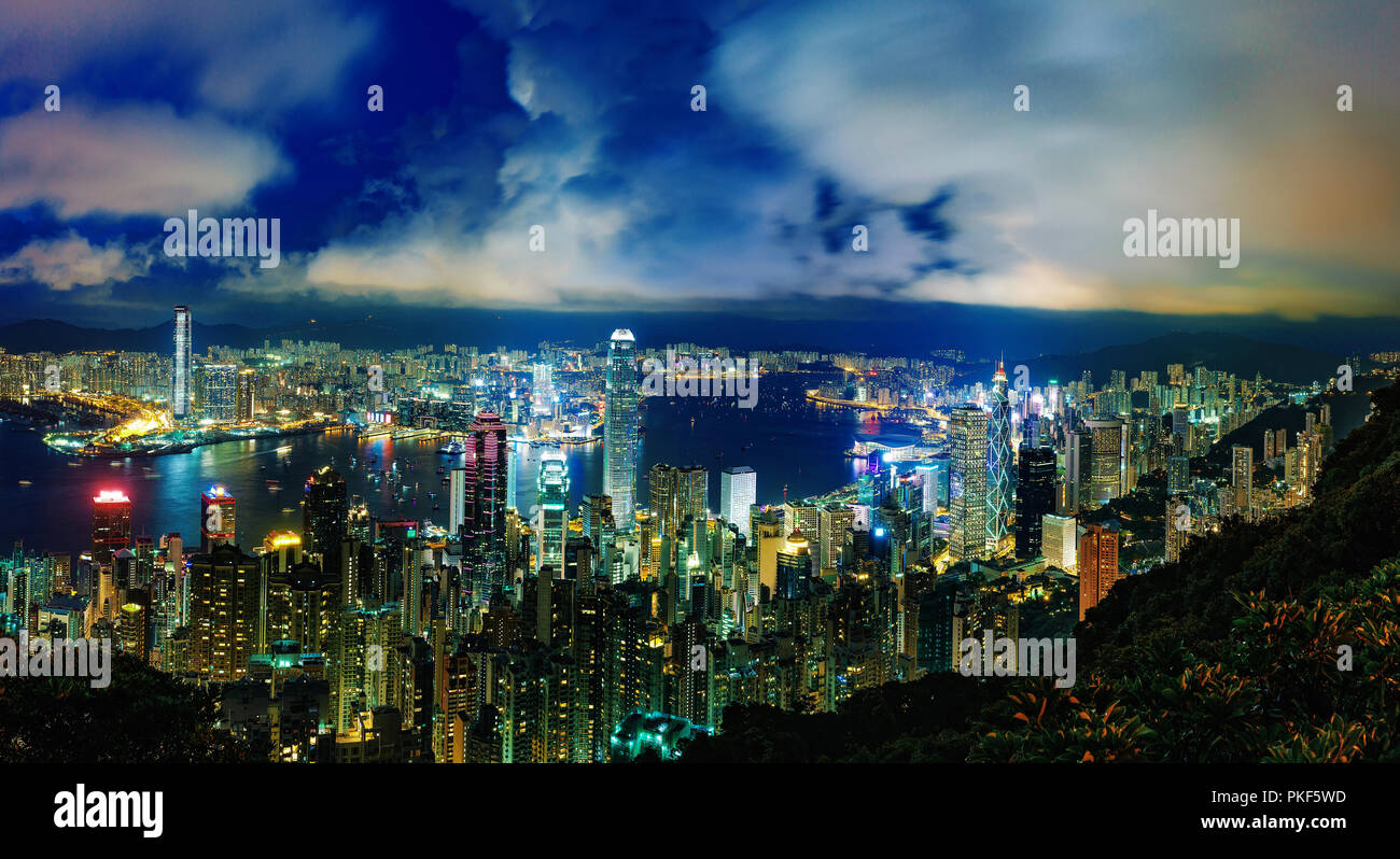 Hong Kong city buildings at night Stock Photo - Alamy