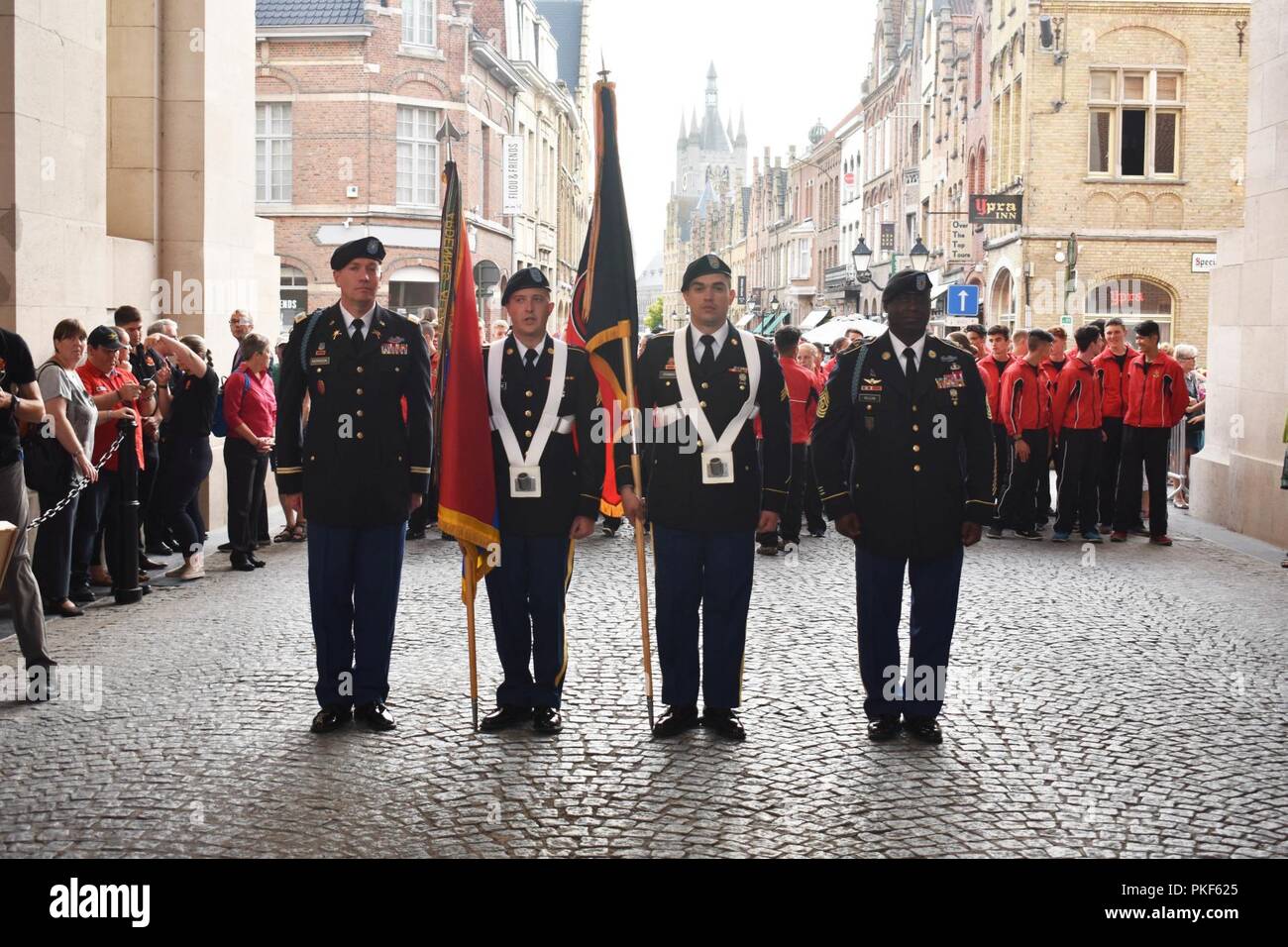 U.S. Army National Guard Soldiers from the 27th Infantry Brigade Combat Team and 30th Infantry Brigade Combat Team, take part in the Last Post Ceremony at the Menin Gate-- a British War Memorial-- in Ypres, Belgium, August 4, 2018. The Last Post Ceremony is a ceremony held every night at the Menin Gate, to honor fallen British Soldiers from World War One. (N.Y. Army National Guard Stock Photo