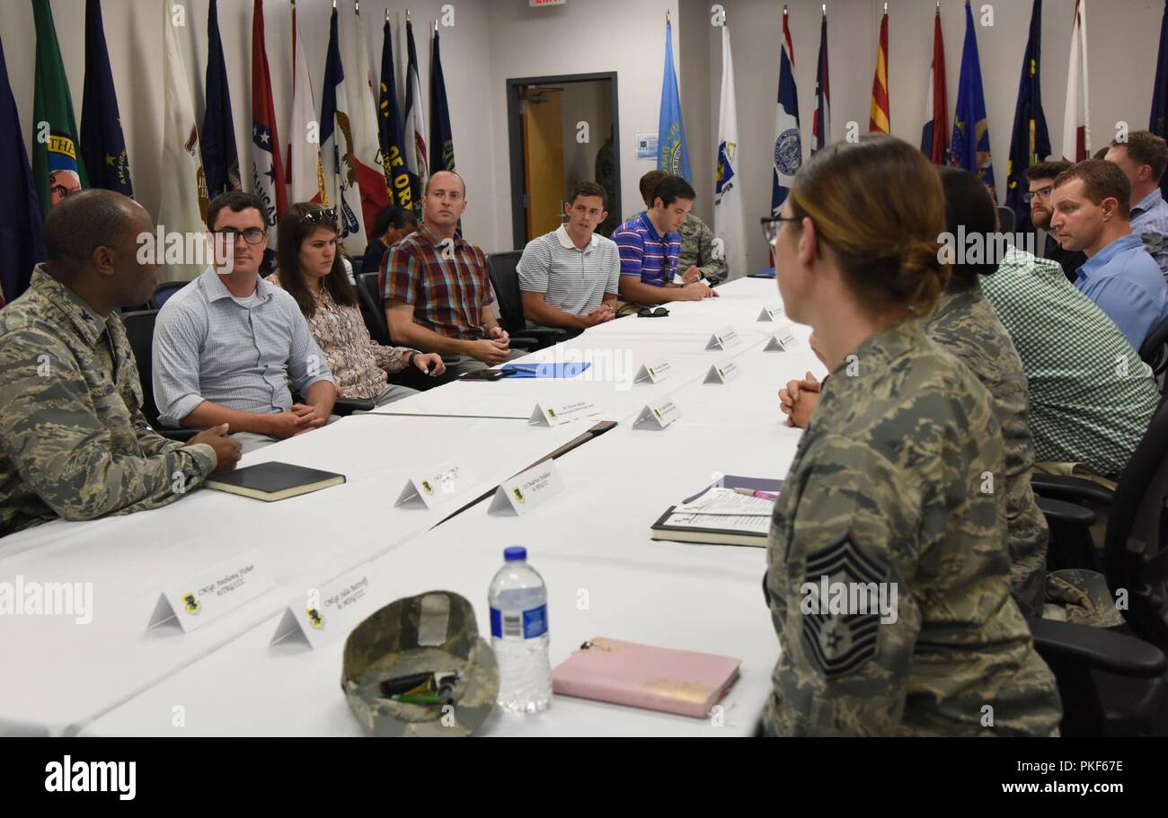 U.S. Air Force Col. Leo Lawson, Jr., 81st Training Group commander, briefs congressional staffers on training innovation projects at the Levitow Training Support Facility on Keesler Air Force Base, Mississippi, Aug. 6, 2018. The staffers visited Keesler from the offices of Senators Roger Wicker and Cindy Hyde-Smith and Congressman Trent Kelly to receive an overview of the 81st Training Wing to identify areas which could use congressional support. Stock Photo