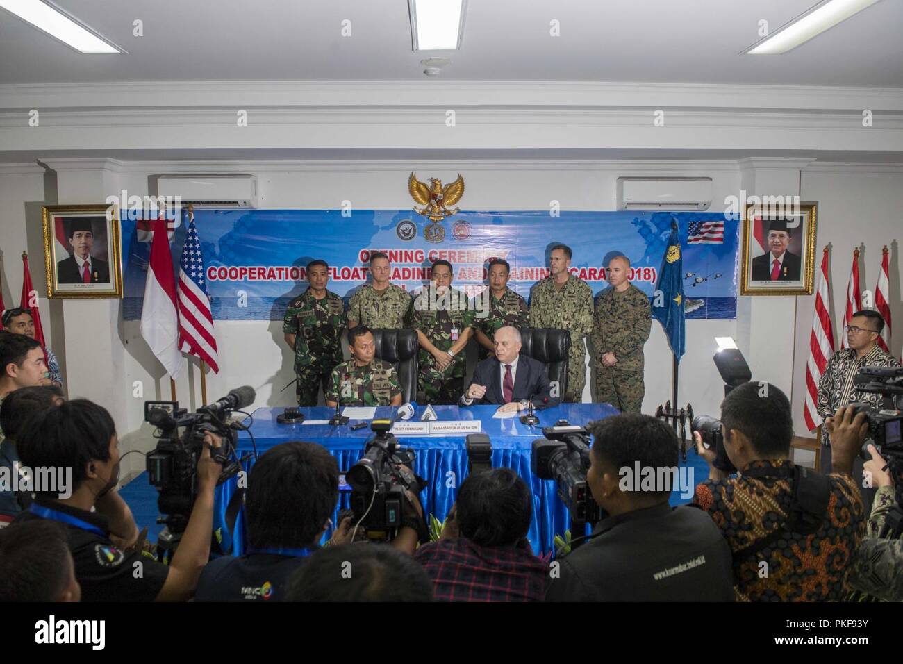 JAKARTA, INDONESIA (Aug. 10, 2018) – Indonesian Chief of Staff of First Fleet first admiral Herru Kusmanto, left, and the honorable Joseph Donovan Jr., U.S. Ambassador to the Republic of Indonesia, answer questions at a press conference during the opening ceremony of Cooperation And Readiness Afloat Training (CARAT) 2018. CARAT Indonesia, in its 24th iteration, is designed to enhance information sharing and coordination, build mutual warfighting capability and support long-term regional cooperation enabling both partner armed forces to operate effectively together as a unified maritime force. Stock Photo