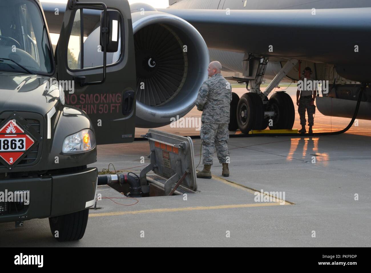 Staff Sgt. Justin Kernen 132d Wing, Iowa Air National Guard, Des Moines, Iowa works with 185th Air Refueling Wing Crew Chief, Staff Sgt. Layton Welsh fueling a U.S. Air Force KC-135 on the morning of August 10, 2018 in Sioux City, Iowa. Kernen is on loan to the 185th ARW this week performing annual training.    U.S. Air National Guard Stock Photo