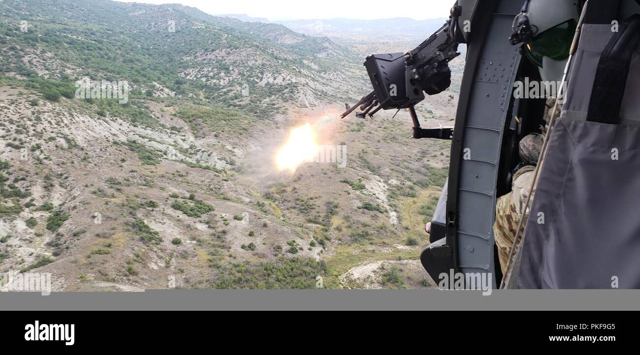 Aviators from 3rd Battalion, 126th Aviation Regiment, Massachusetts National Guard, conduct aerial gunnery at the Krivolak Training Area in the Republic of Macedonia. The gunnery is taking place over three weeks Aug. 1-18. Stock Photo