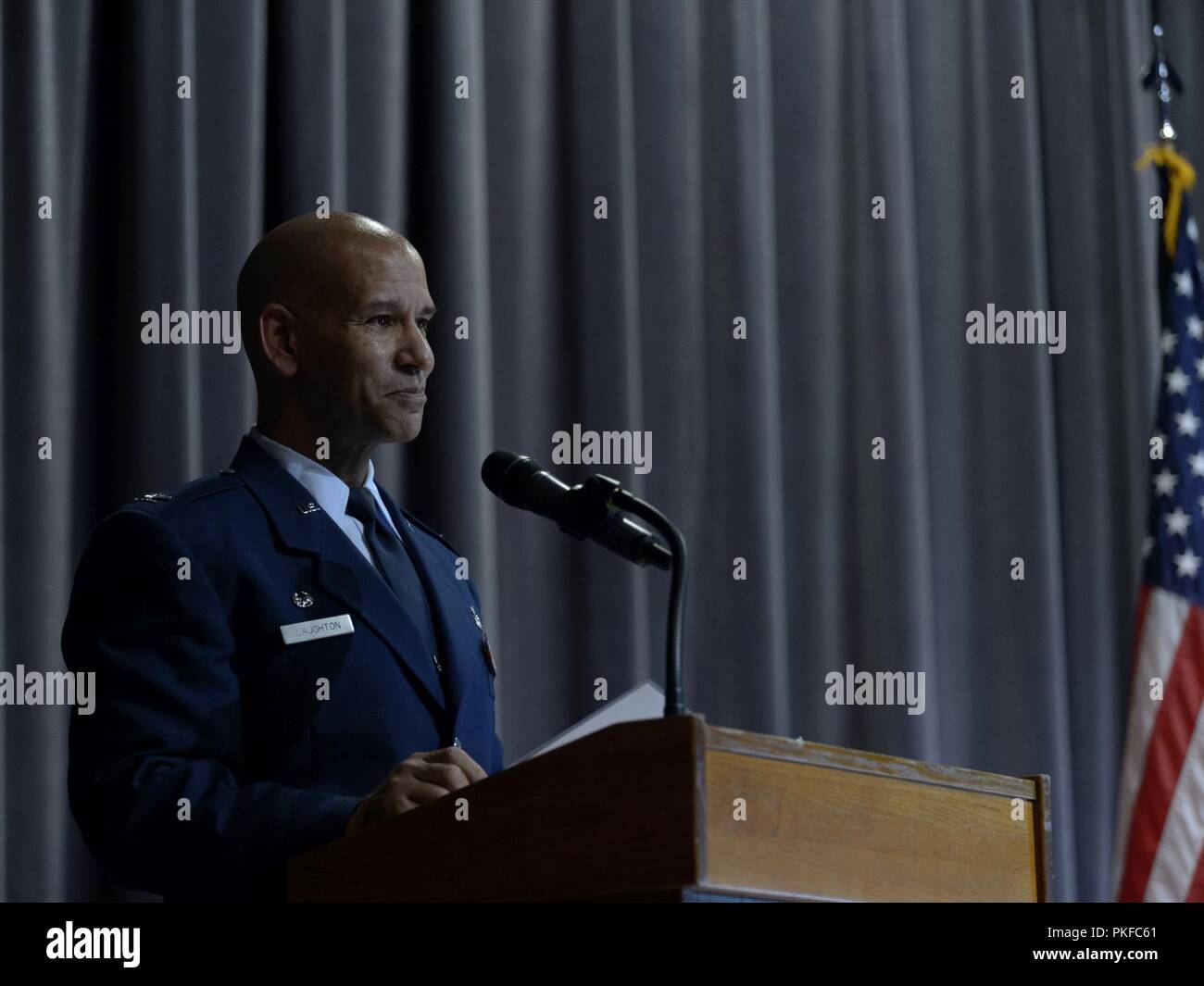 Col. Eric Laughton, commander of the 107th Medical Group, 107th Attack Wing, New York National Guard, speaks after being promoted from lieutenant colonel during a ceremony at Niagara Falls Air Reserve Station, N.Y., Aug. 11, 2018. The ceremony took place during drill weekend and was attended by Airmen, family and friends. Stock Photo